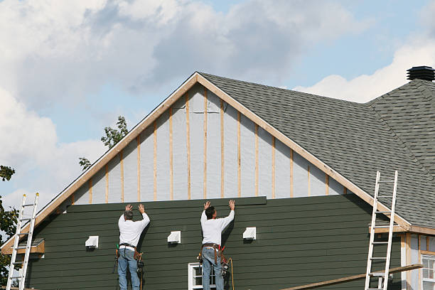 Professional Siding Contractor technician working in Wayland, MA